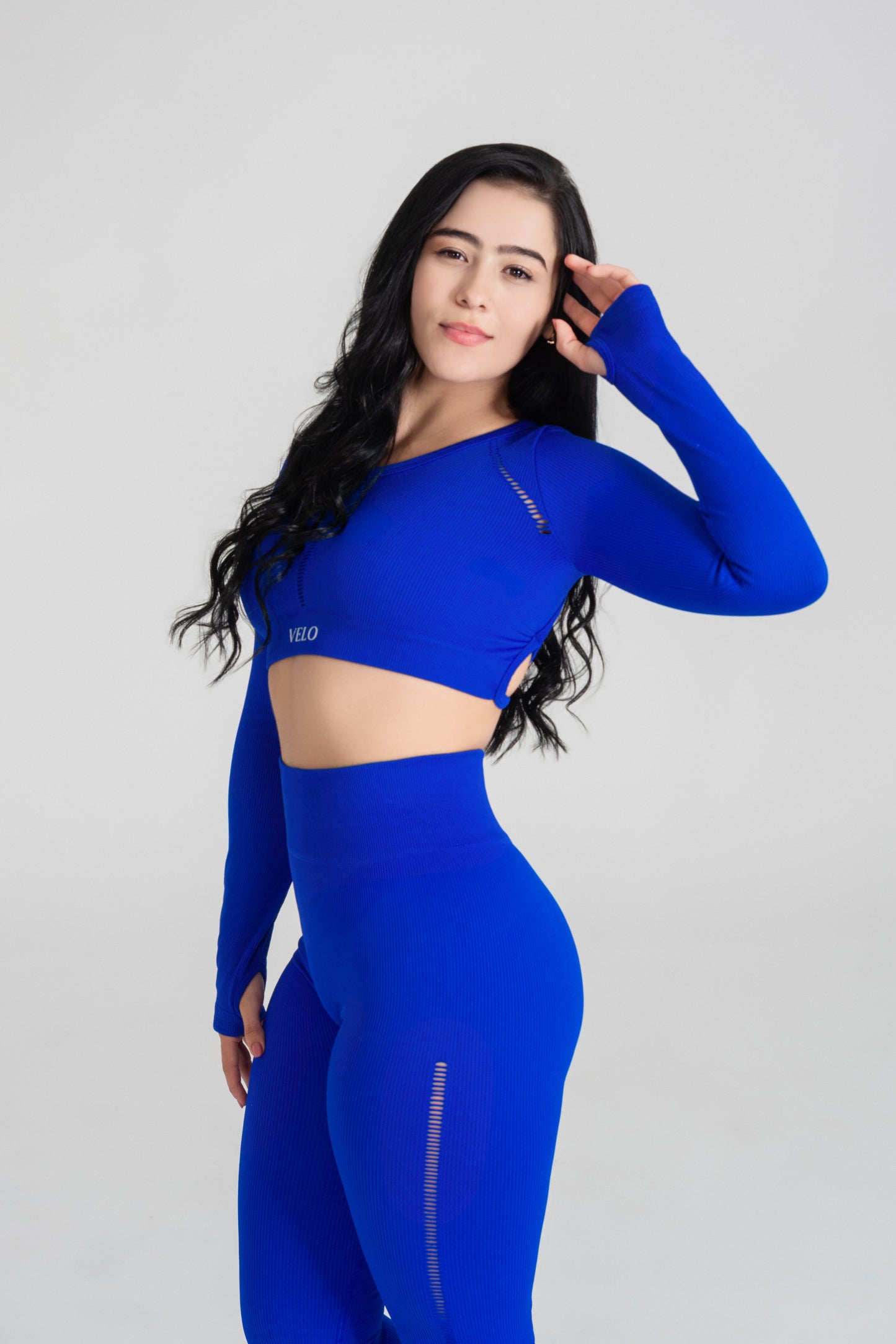 VELO blue seamless activewear set side view studio