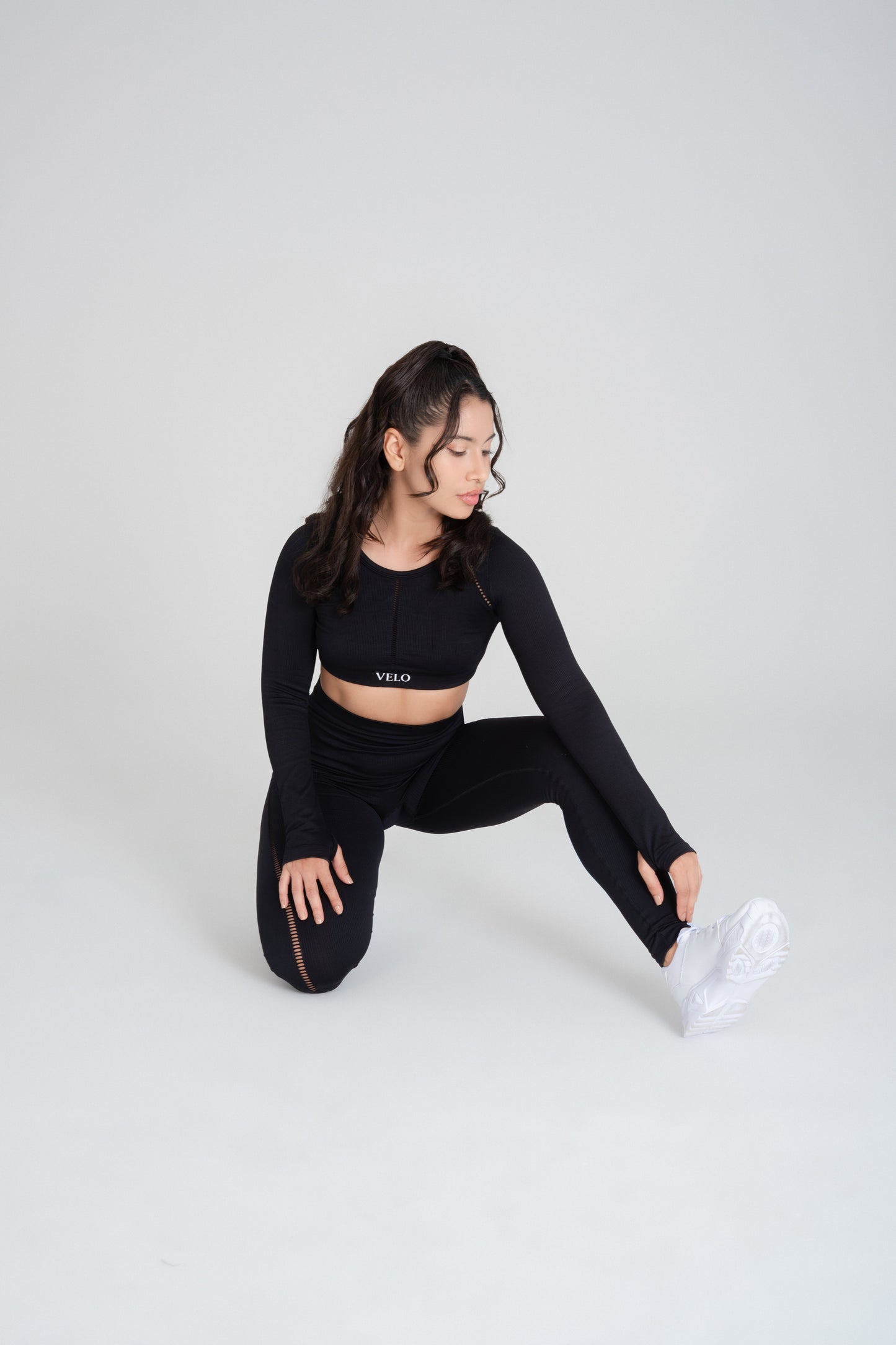 VELO black seamless activewear set front view studio