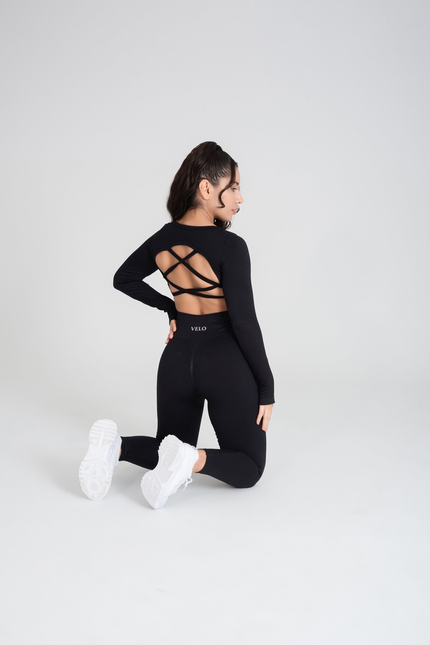 VELO black seamless activewear set back view studio