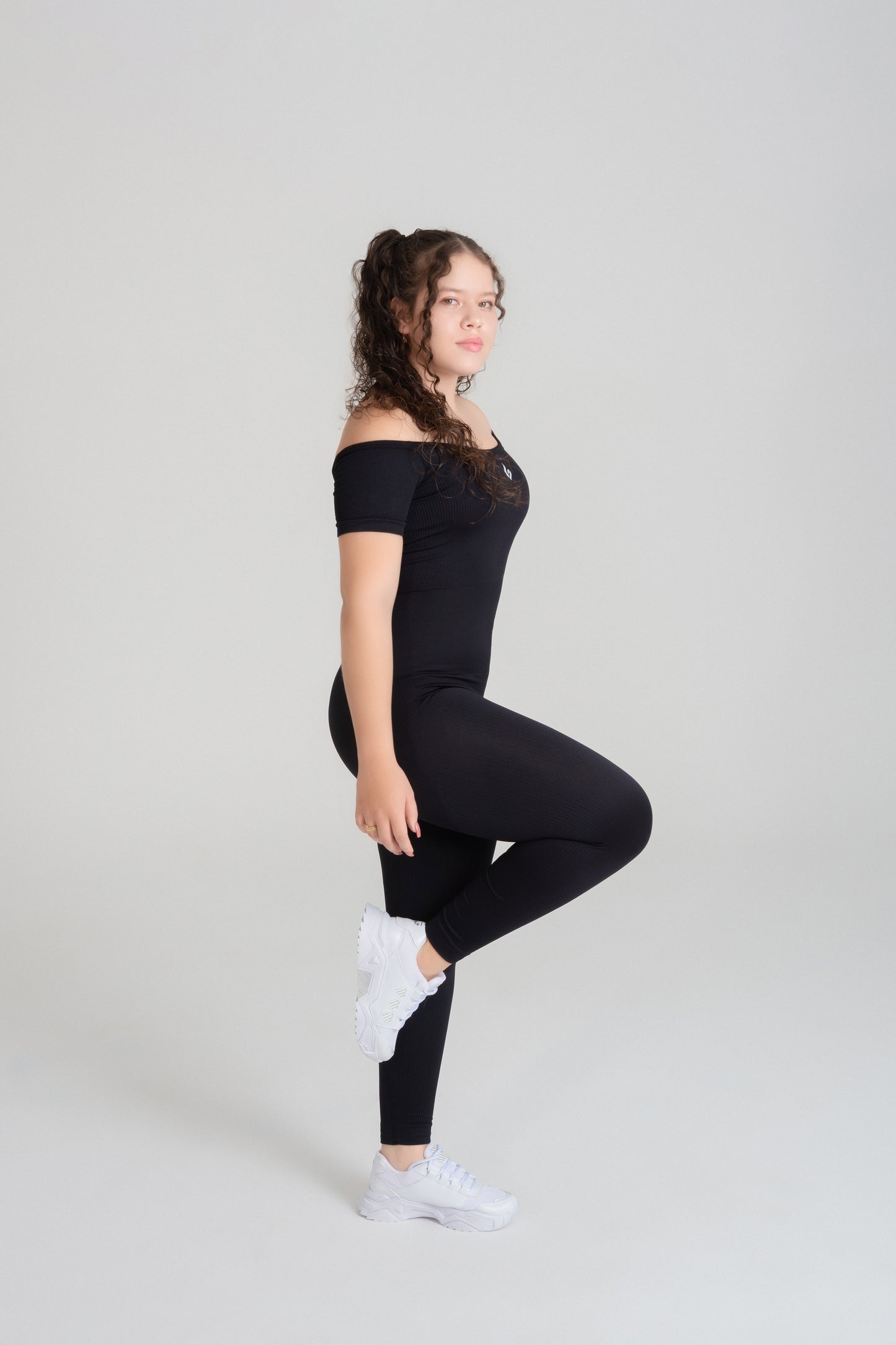 VELO seamless black jumpsuit side view