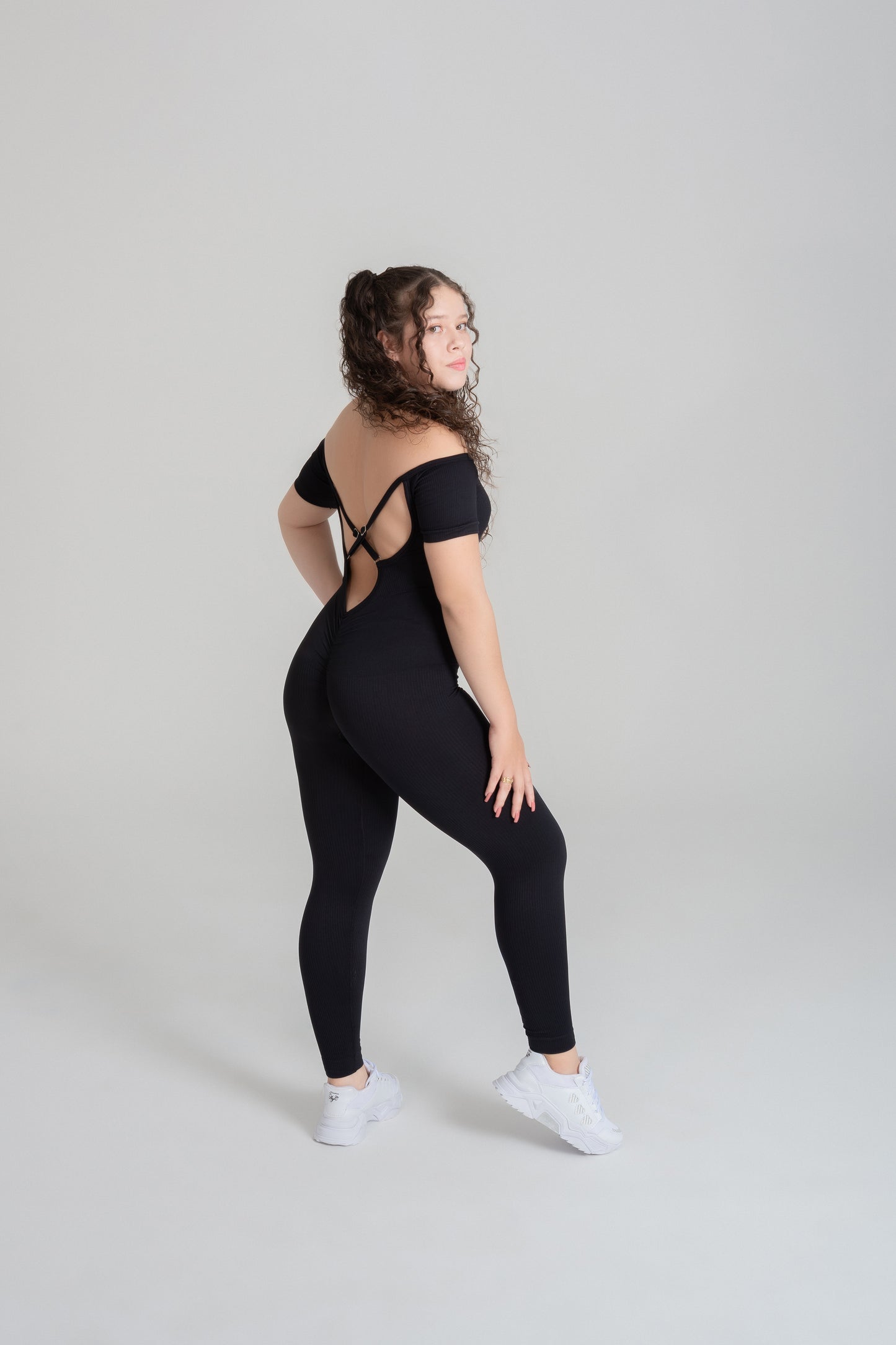 VELO seamless black jumpsuit back view open back full body